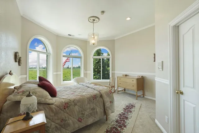 a view of swimming pool from a balcony