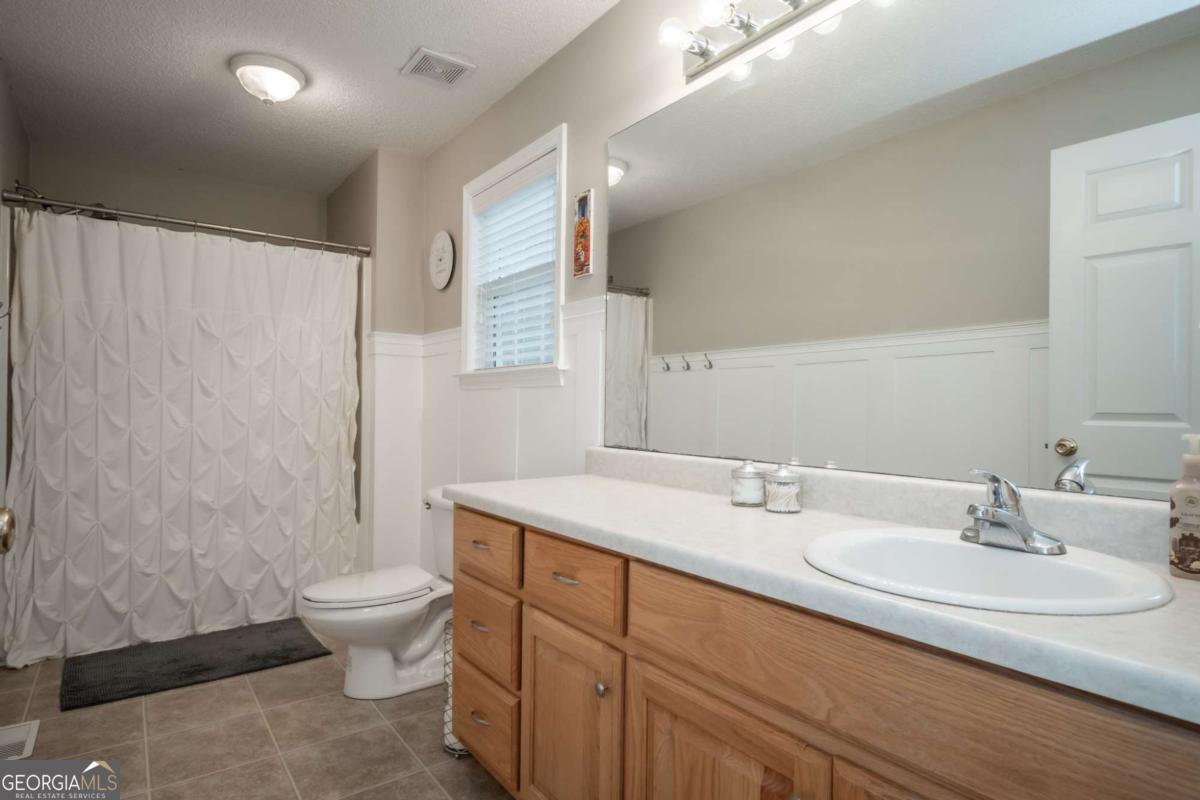 199 Brickyard Road Comer, GA 30629 - Photo 22 of 43 a bathroom with a sink toilet and shower