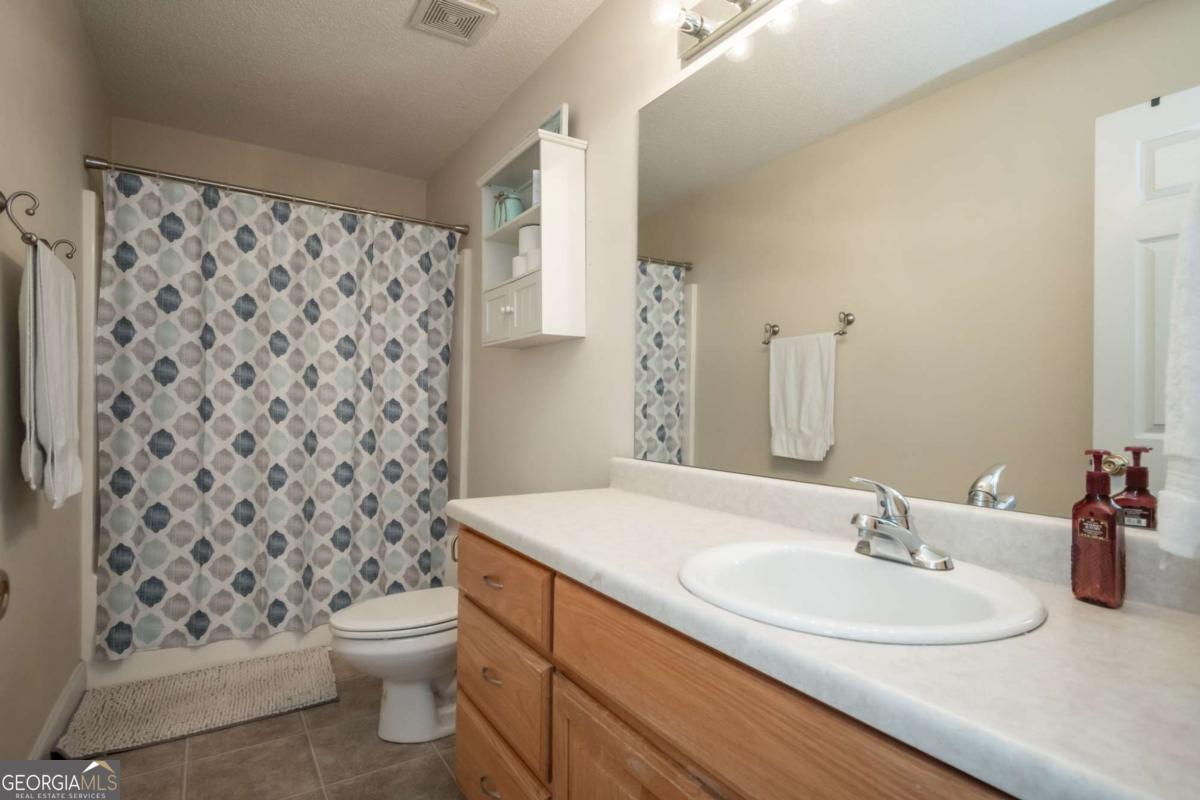199 Brickyard Road Comer, GA 30629 - Photo 26 of 43 a bathroom with a sink toilet and shower