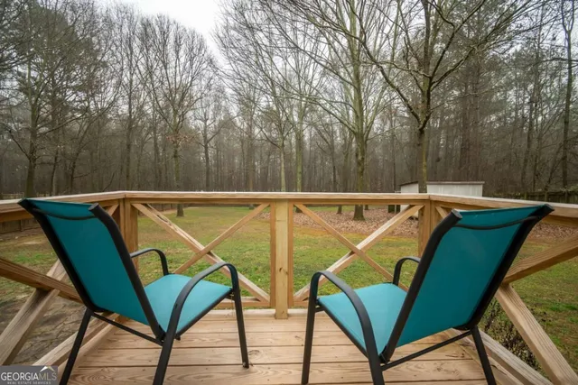 a view of a swimming pool with a lounge chairs