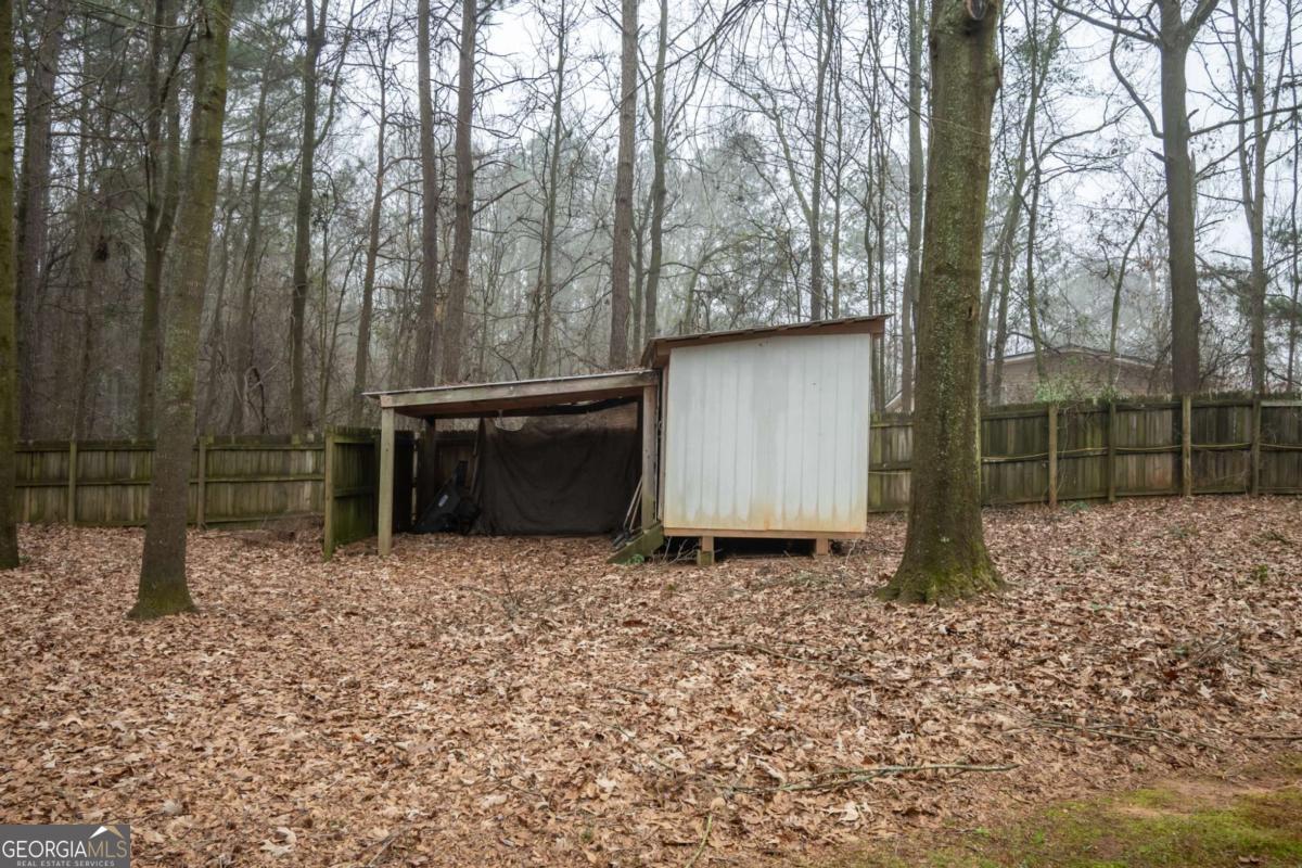 199 Brickyard Road Comer, GA 30629 - Photo 39 of 43 a backyard of a house with lots of green space
