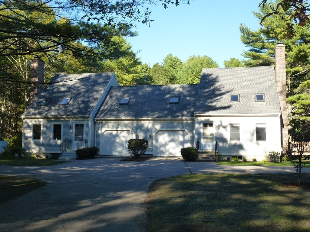 79 Papermill Road, Unit A Wareham, MA 02576 - Photo 2 of 28 a front view of a house with a garden