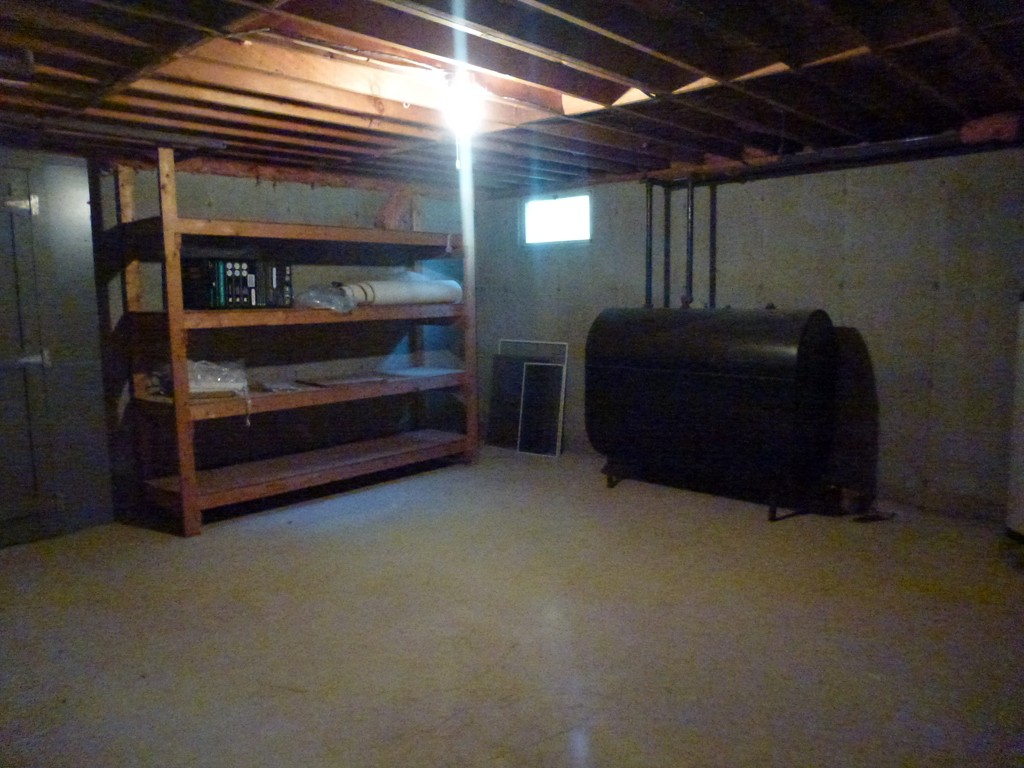 79 Papermill Road, Unit A Wareham, MA 02576 - Photo 24 of 28 a room with lots of wooden furniture and a window