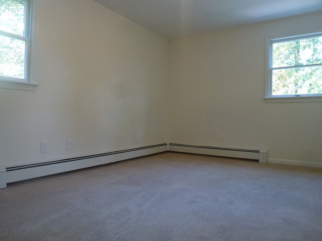 79 Papermill Road, Unit A Wareham, MA 02576 - Photo 9 of 28 an empty room with a window