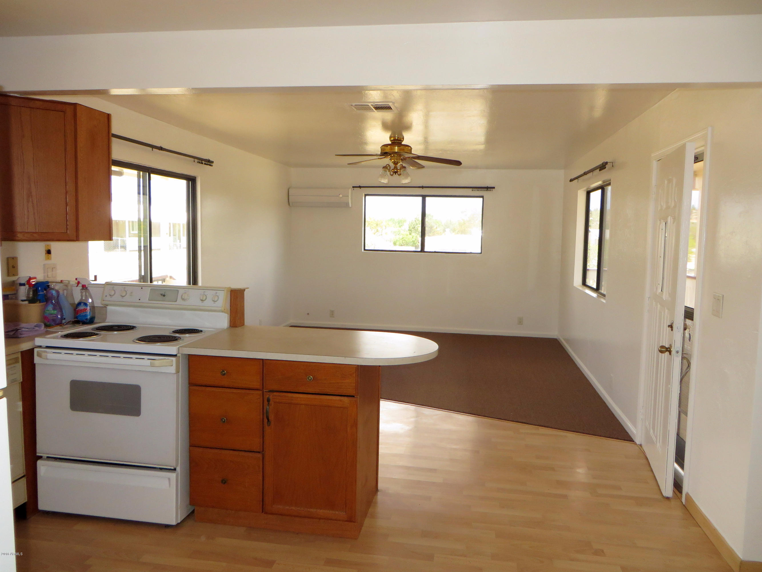 18404 Weaver Mountain Road Peeples Valley, AZ 86332 - Photo 5 of 54 Breakfast Bar and Living Room Beyond