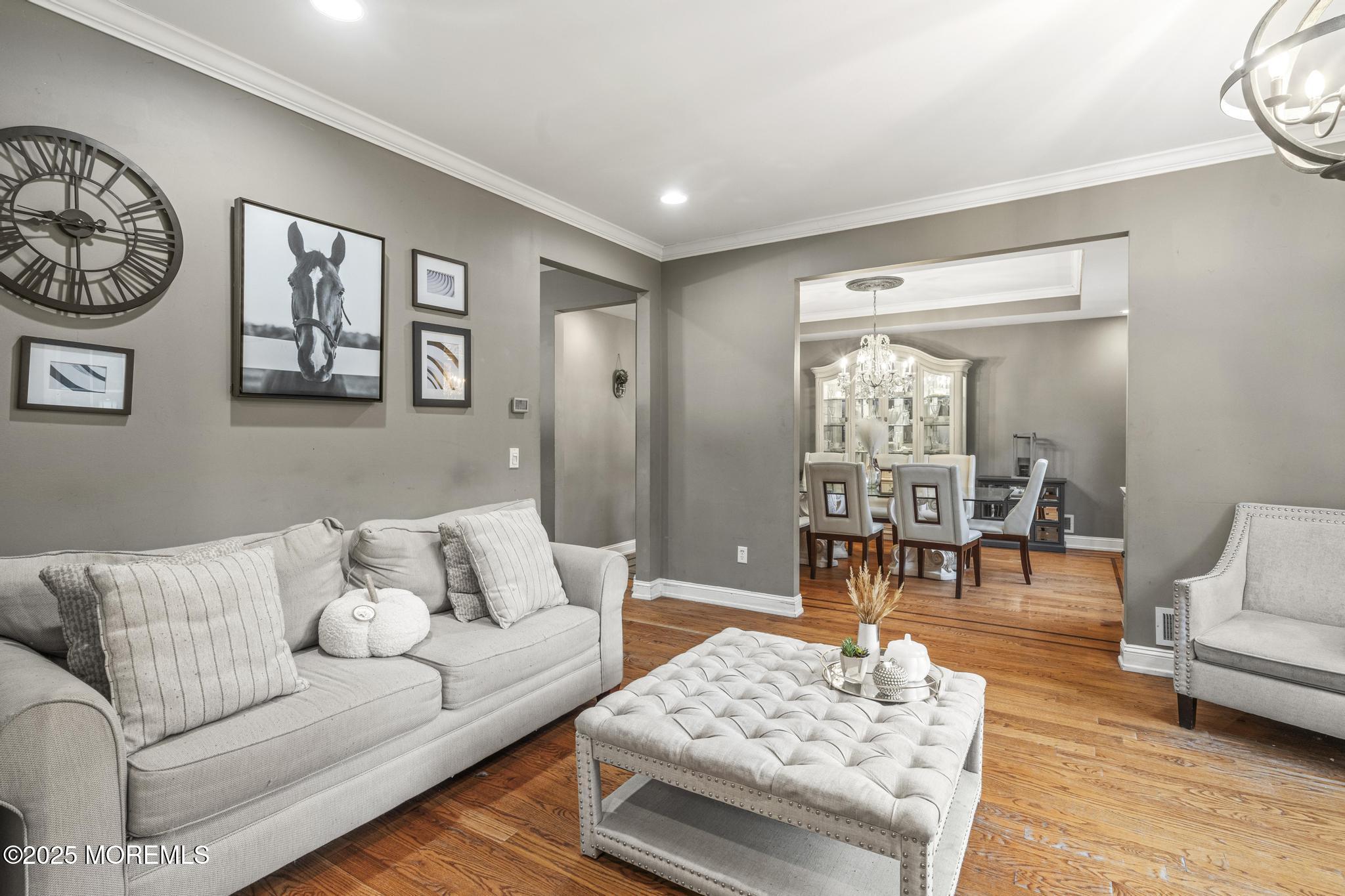 33 Harbor Road Morganville, NJ 07751 - Photo 11 of 49 a living room with furniture and wooden floor