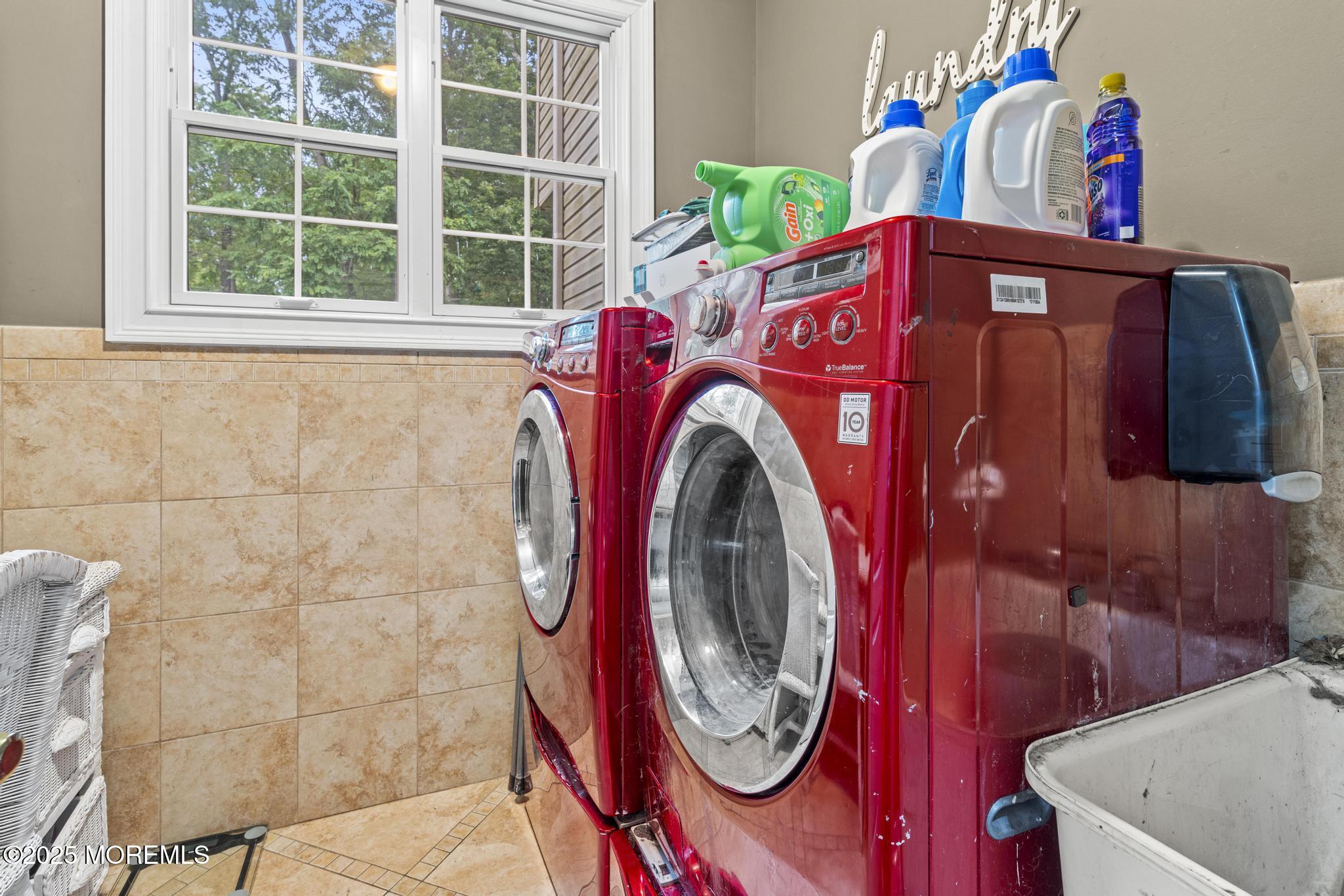 33 Harbor Road Morganville, NJ 07751 - Photo 24 of 49 a utility room with dryer and washer