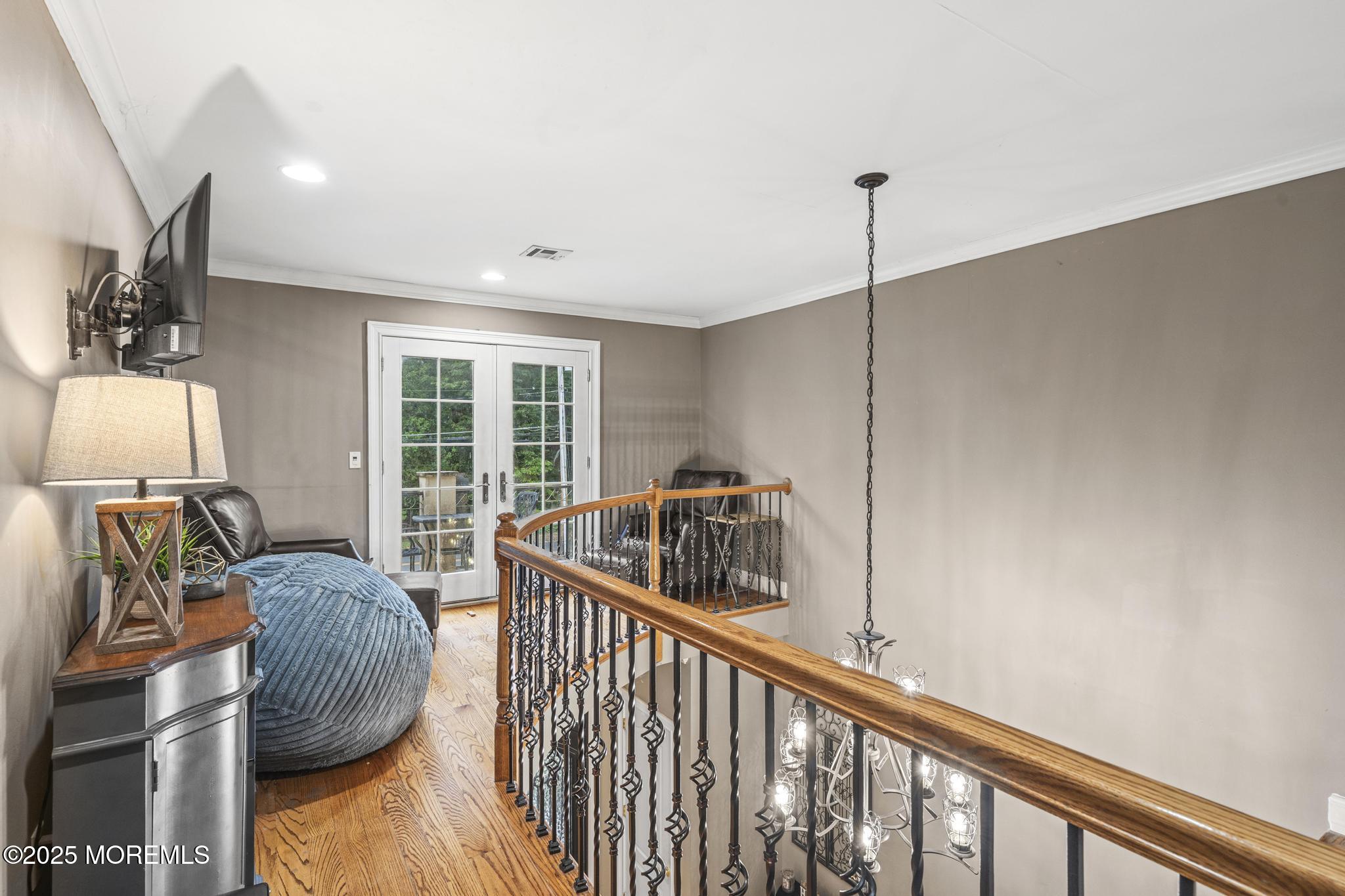 33 Harbor Road Morganville, NJ 07751 - Photo 26 of 49 a view of living room with furniture and floor to ceiling window