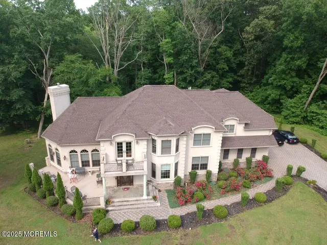 front view of a house with a garden