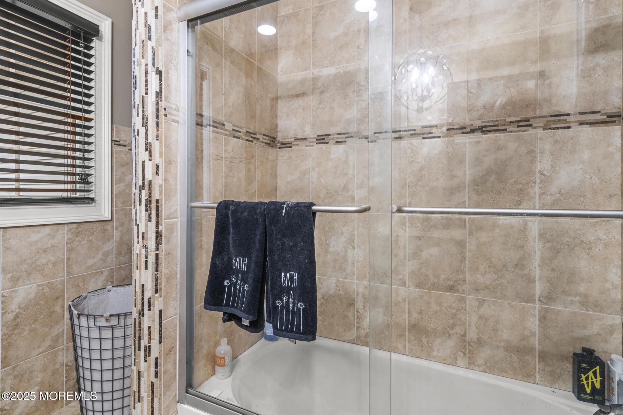 33 Harbor Road Morganville, NJ 07751 - Photo 37 of 49 a bathroom with a shower