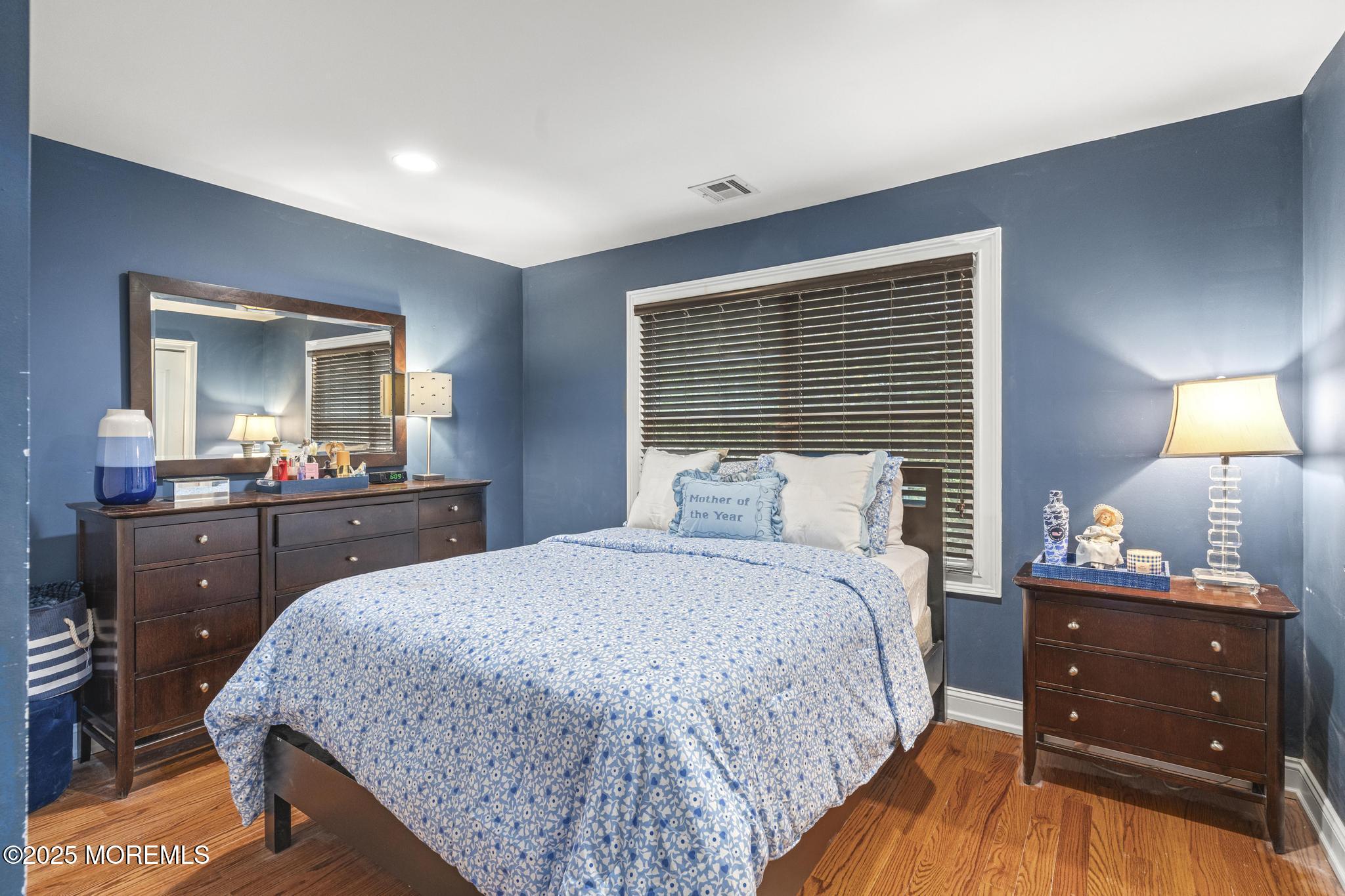 33 Harbor Road Morganville, NJ 07751 - Photo 38 of 49 a bedroom with a bed and a closet