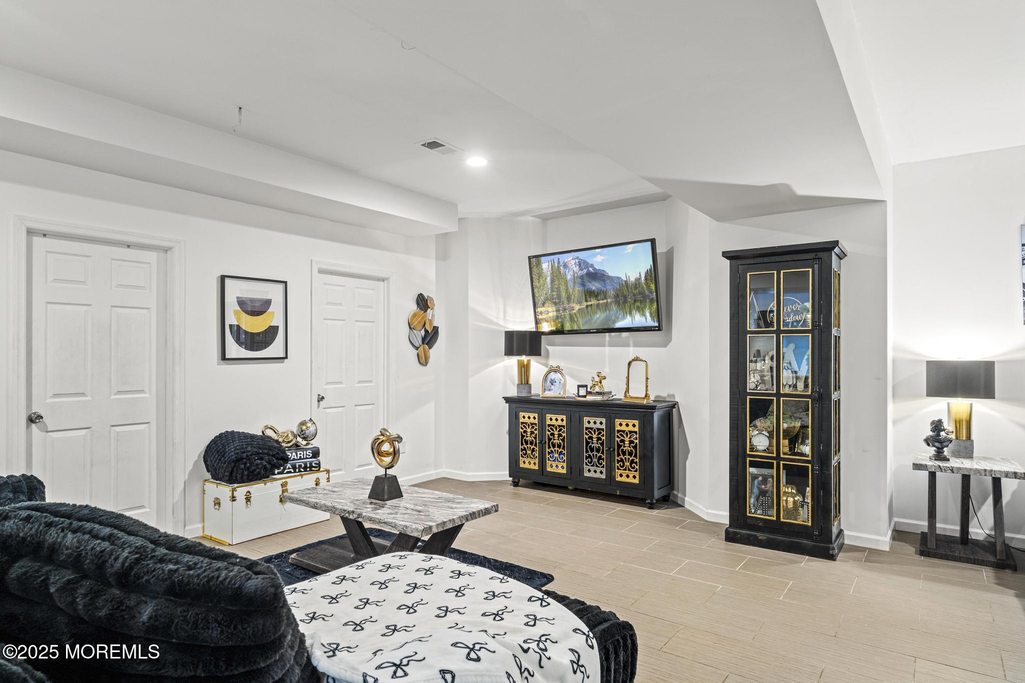 33 Harbor Road Morganville, NJ 07751 - Photo 41 of 49 a bedroom with furniture a baby crib and dresser