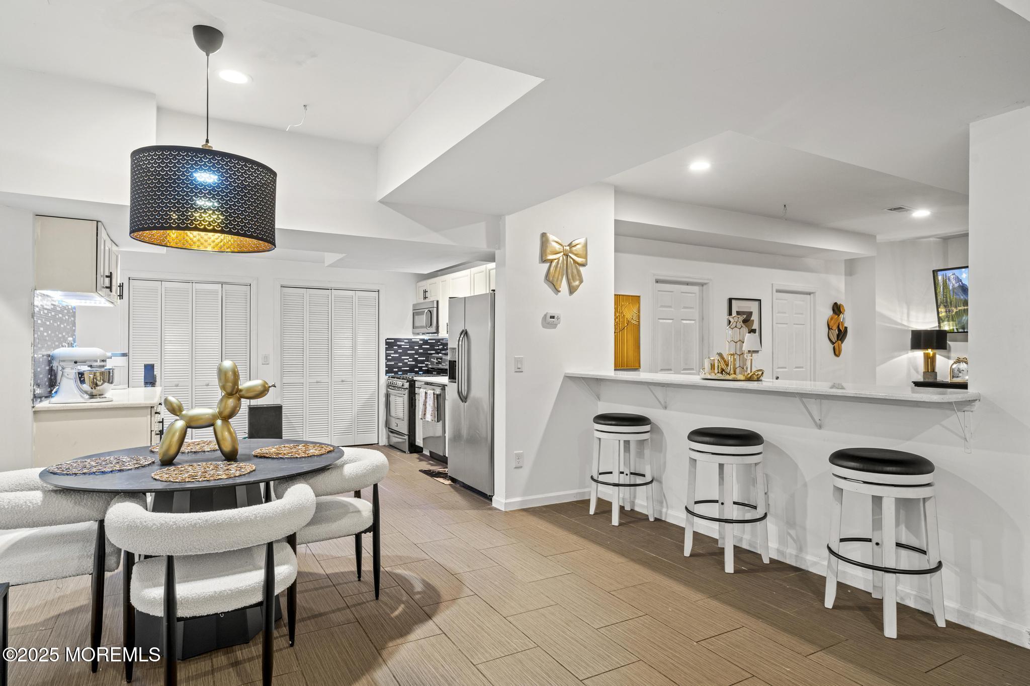 33 Harbor Road Morganville, NJ 07751 - Photo 42 of 49 a dining room with furniture and window