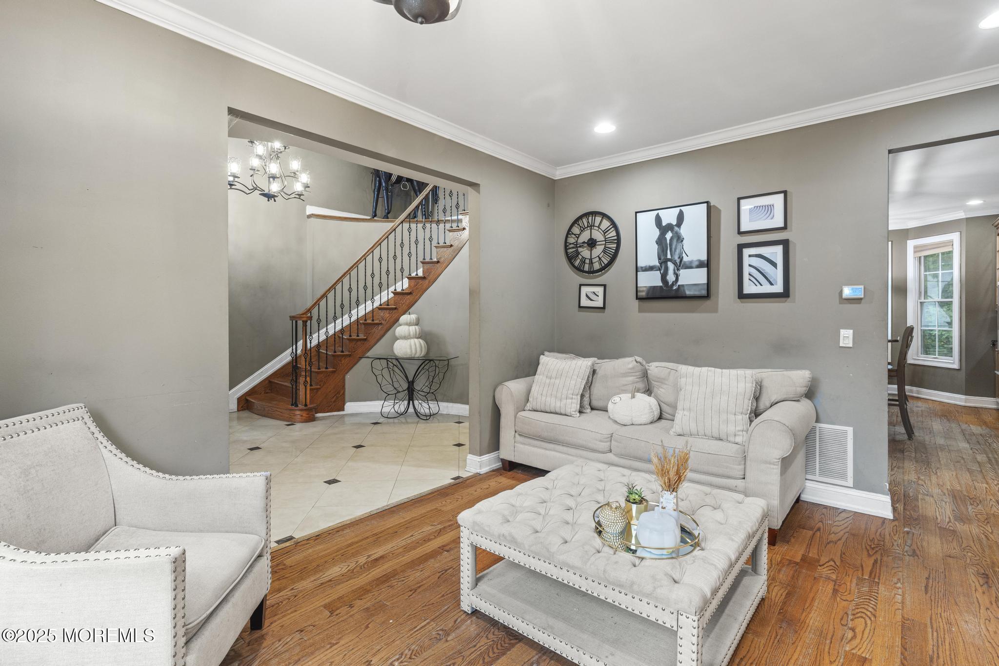 33 Harbor Road Morganville, NJ 07751 - Photo 10 of 49 a living room with furniture and wooden floor