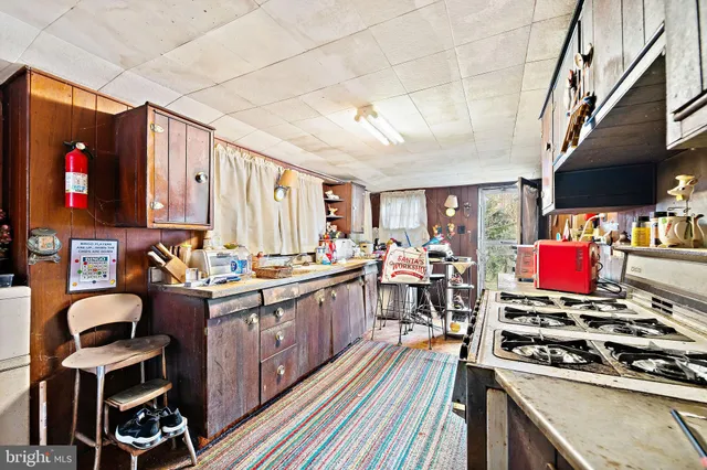 a kitchen with lots of appliances