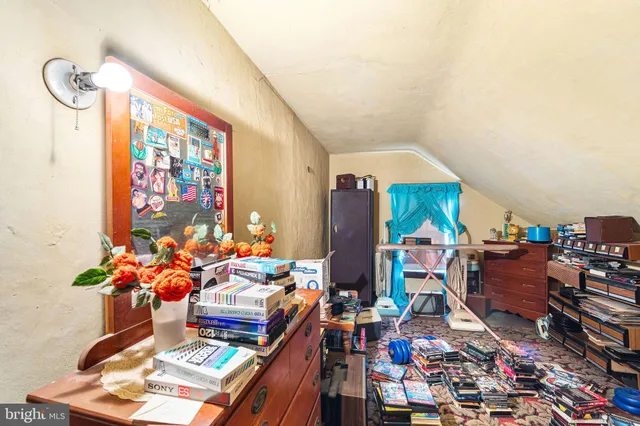a utility room with multiple dryer and washer