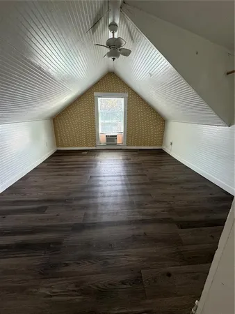 a view of room window and wooden floor