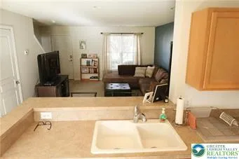 a bathroom with a sink a mirror and a bathtub