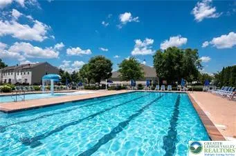 a view of outdoor space yard and swimming pool