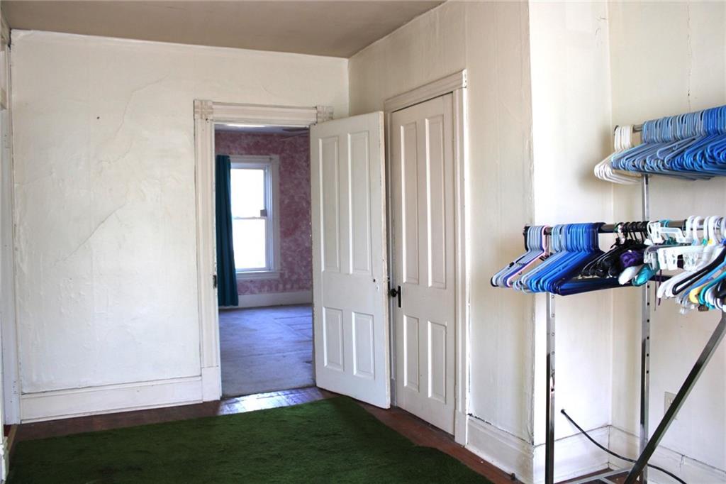 324 West North Street Butler, PA 16001 - Photo 30 of 42 a view of a hallway with wooden floor and cabinet