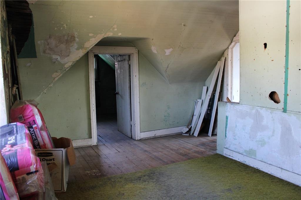 324 West North Street Butler, PA 16001 - Photo 35 of 42 a view of a livingroom with an empty space and a staircase