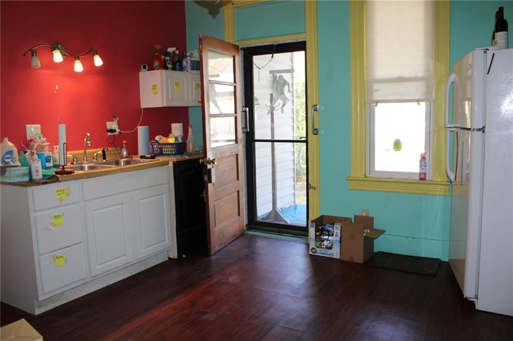 324 West North Street Butler, PA 16001 - Photo 8 of 42 a kitchen with cabinets and wooden floor