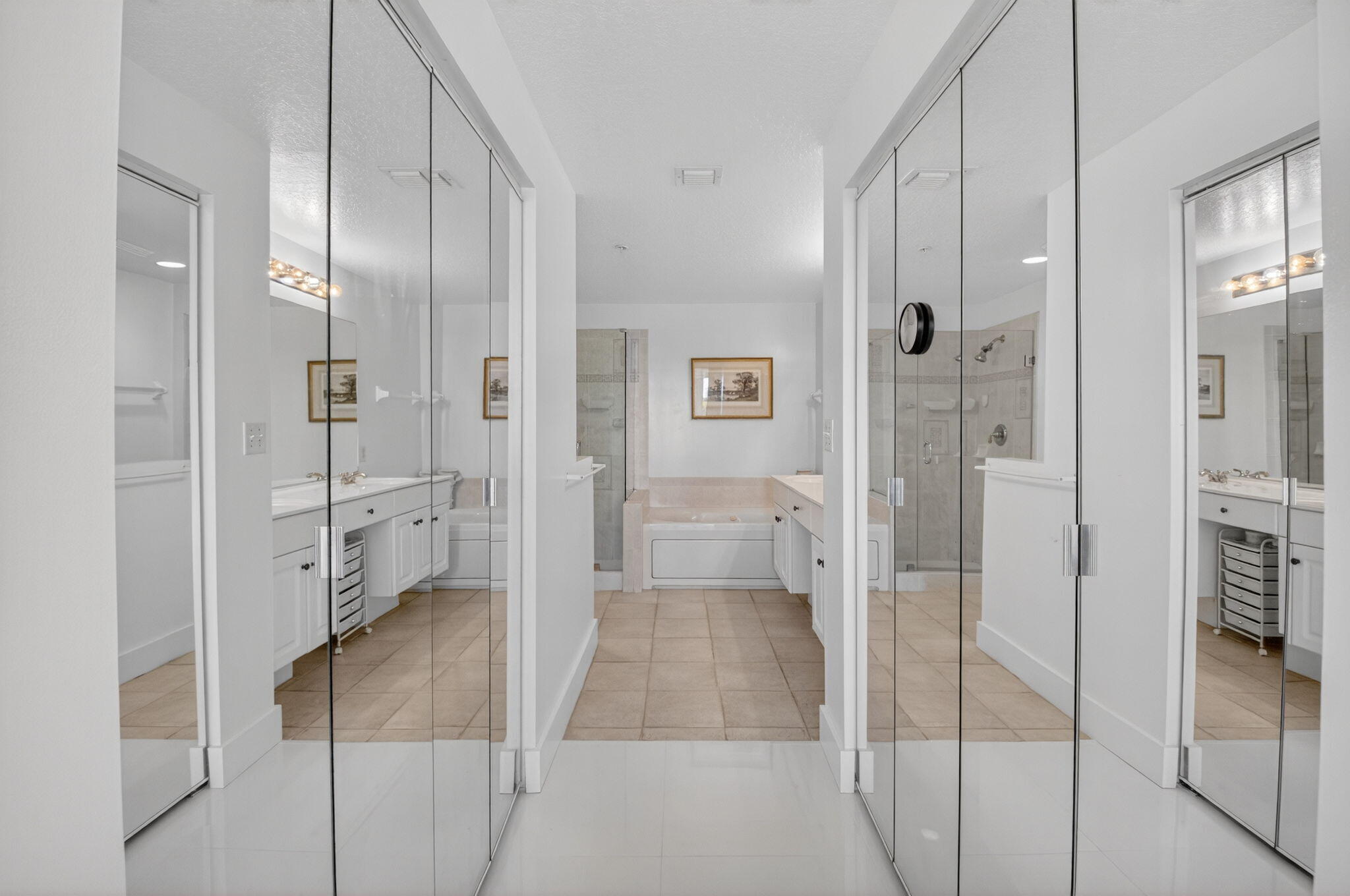 22703 Camino Del Mar, Unit 63 Boca Raton, FL 33433 - Photo 26 of 40 a bathroom with a glass shower door and a glass door