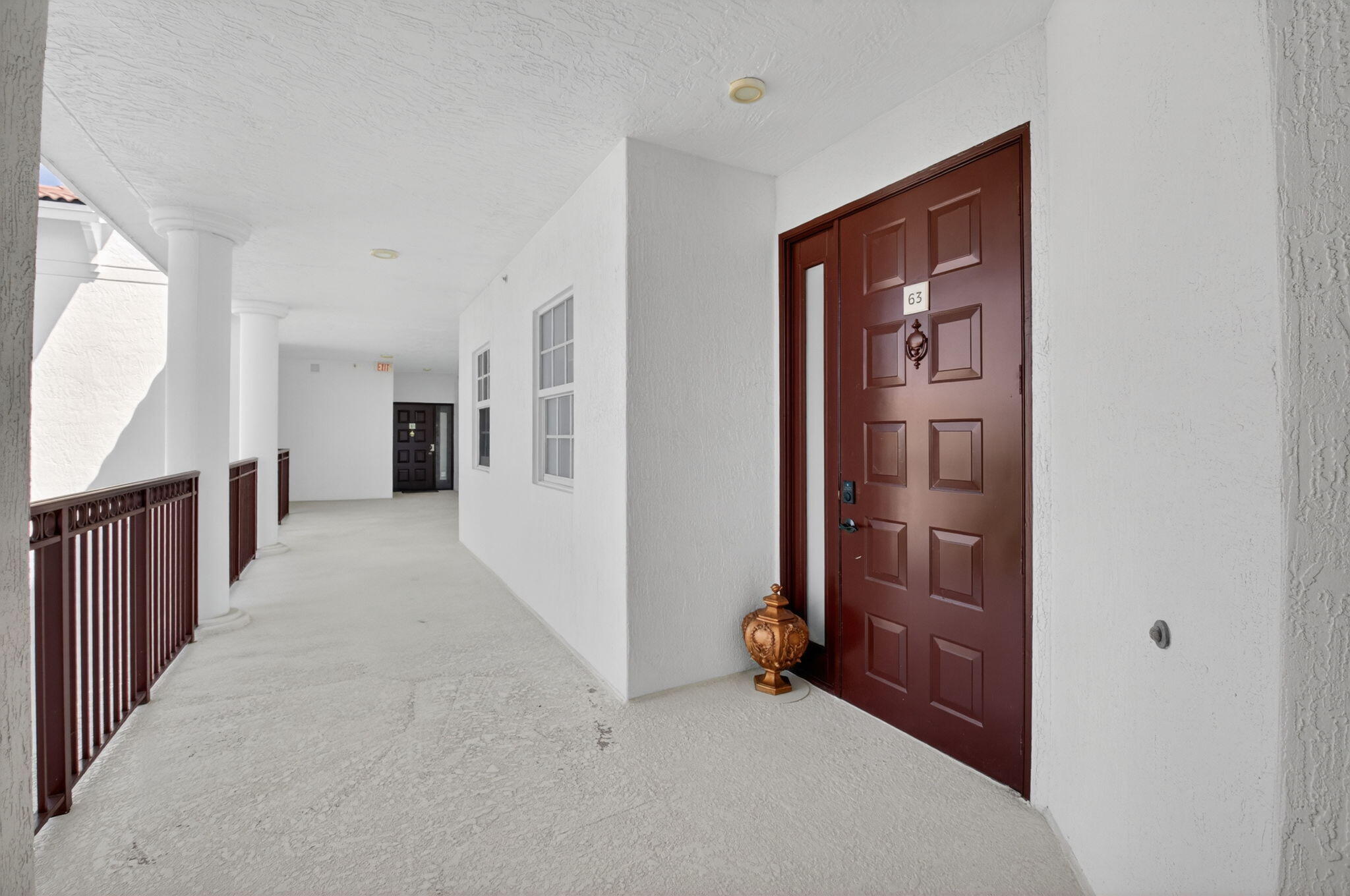 22703 Camino Del Mar, Unit 63 Boca Raton, FL 33433 - Photo 3 of 40 a view of a hallway with closet and entryway