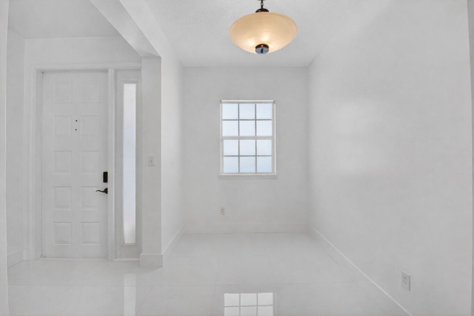 22703 Camino Del Mar, Unit 63 Boca Raton, FL 33433 - Photo 4 of 40 a view of room and window