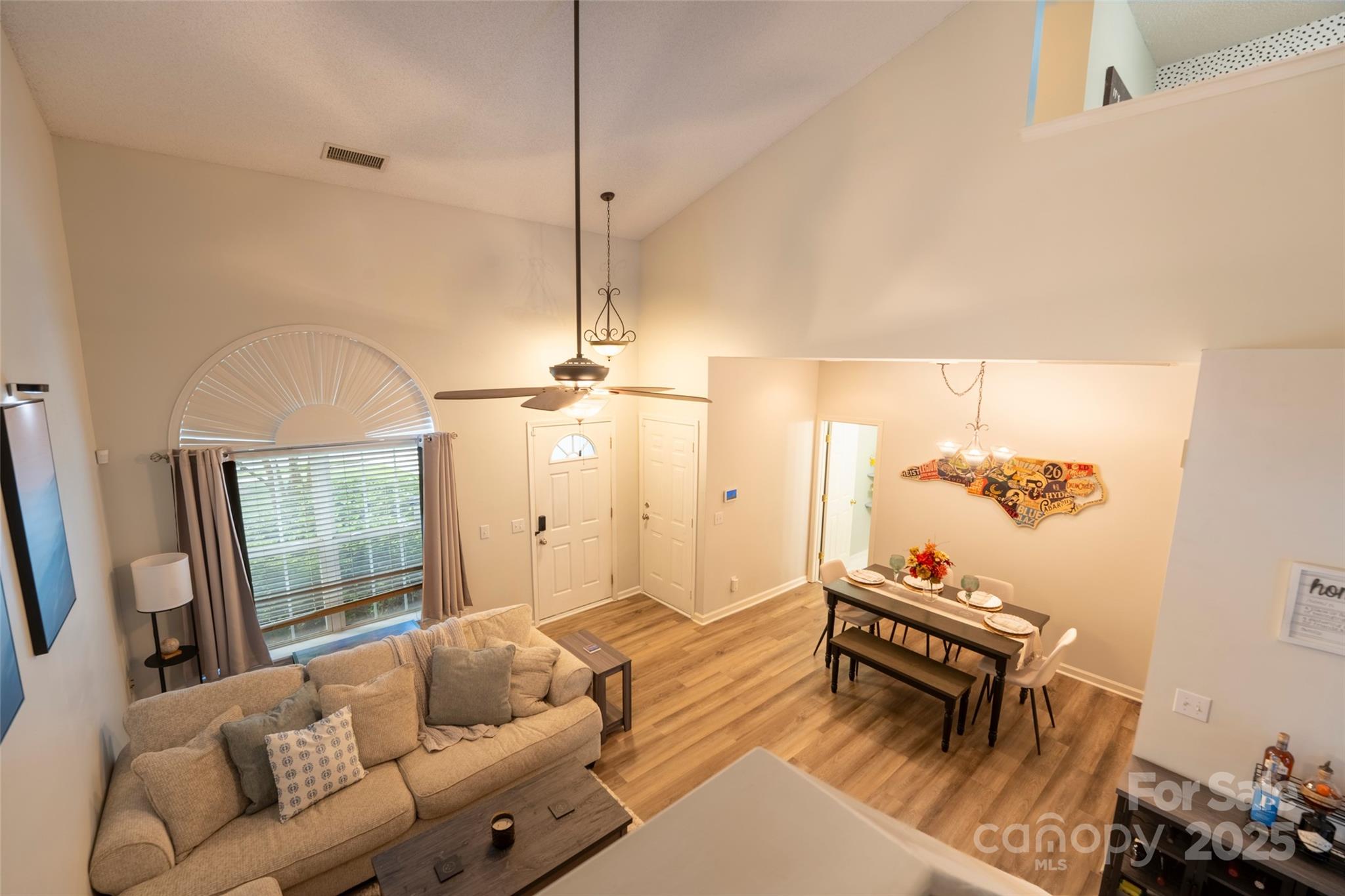 3412 Summerfield Ridge Lane Matthews, NC 28105 - Photo 17 of 30 a living room with furniture and a window