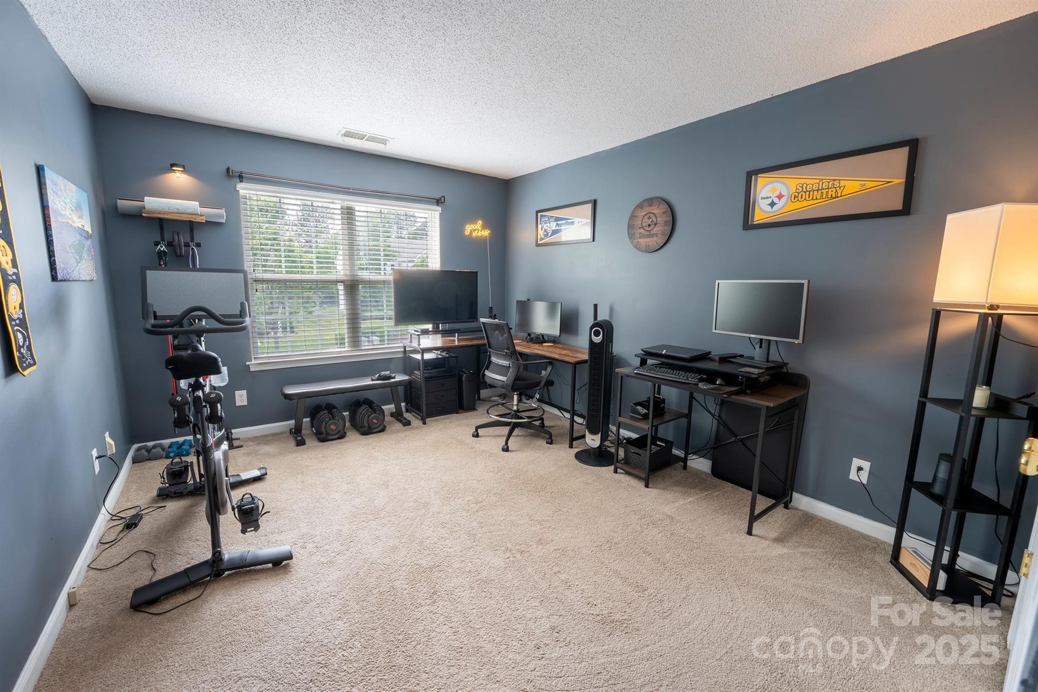 3412 Summerfield Ridge Lane Matthews, NC 28105 - Photo 19 of 30 a view of a workspace with furniture and a window