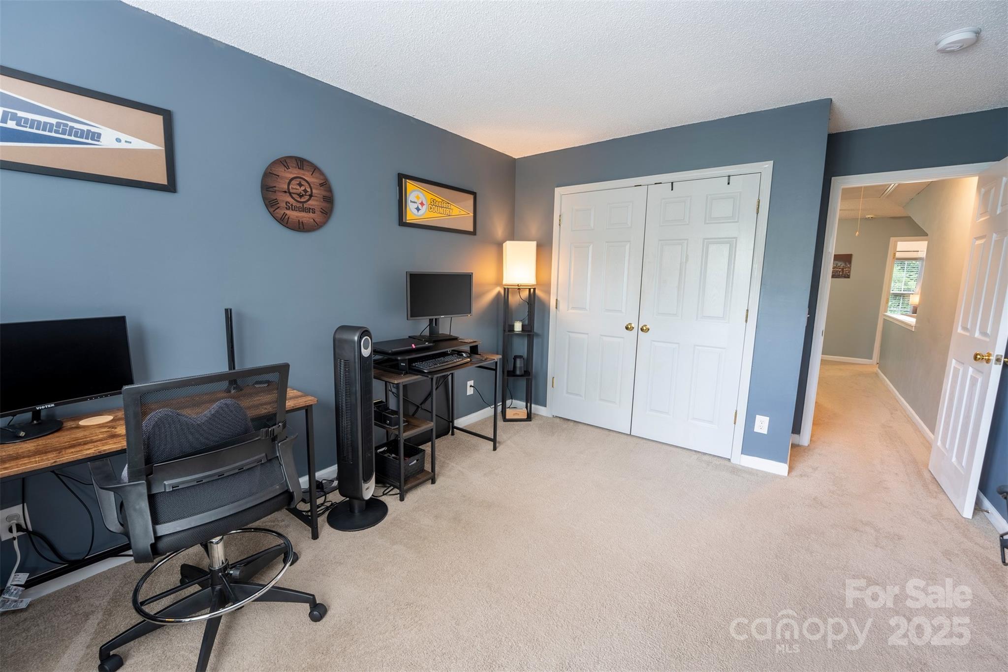 3412 Summerfield Ridge Lane Matthews, NC 28105 - Photo 20 of 30 a view of a workspace with furniture and a window