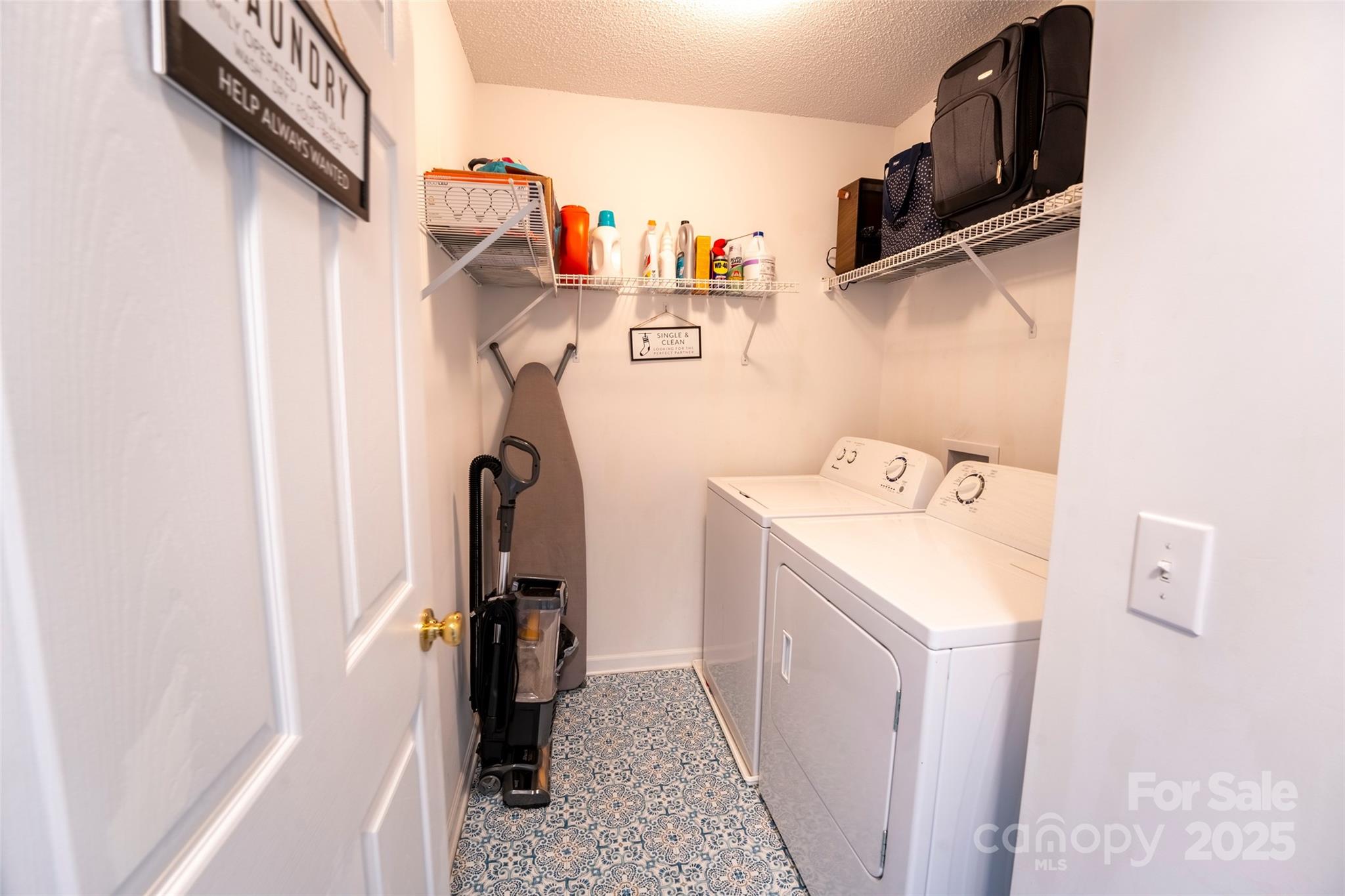 3412 Summerfield Ridge Lane Matthews, NC 28105 - Photo 25 of 30 a utility room with dryer and washer