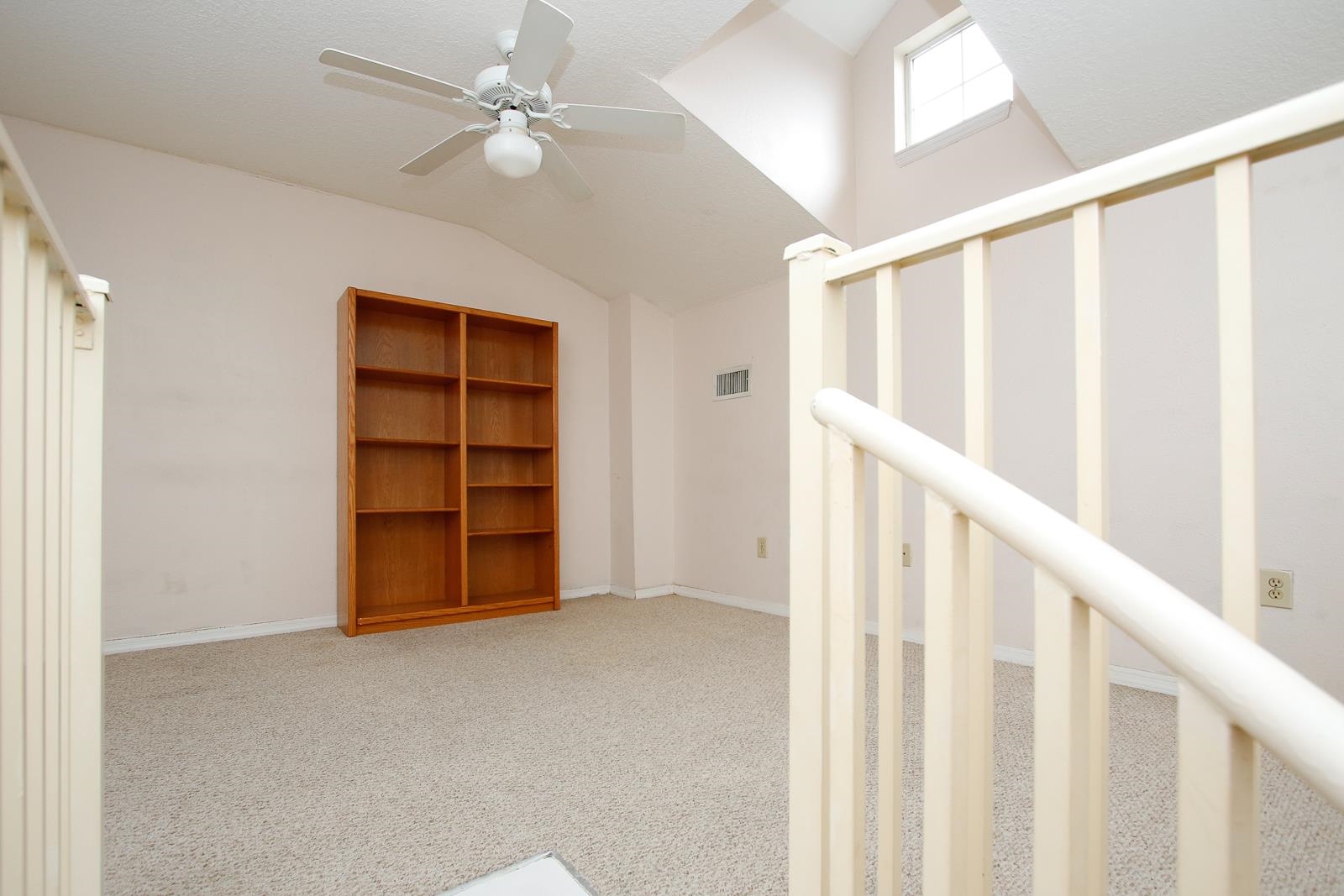 21201 Harbour Vista Circle St. Augustine, FL 32080 - Photo 27 of 43 a view of an empty room with a window and a ceiling fan