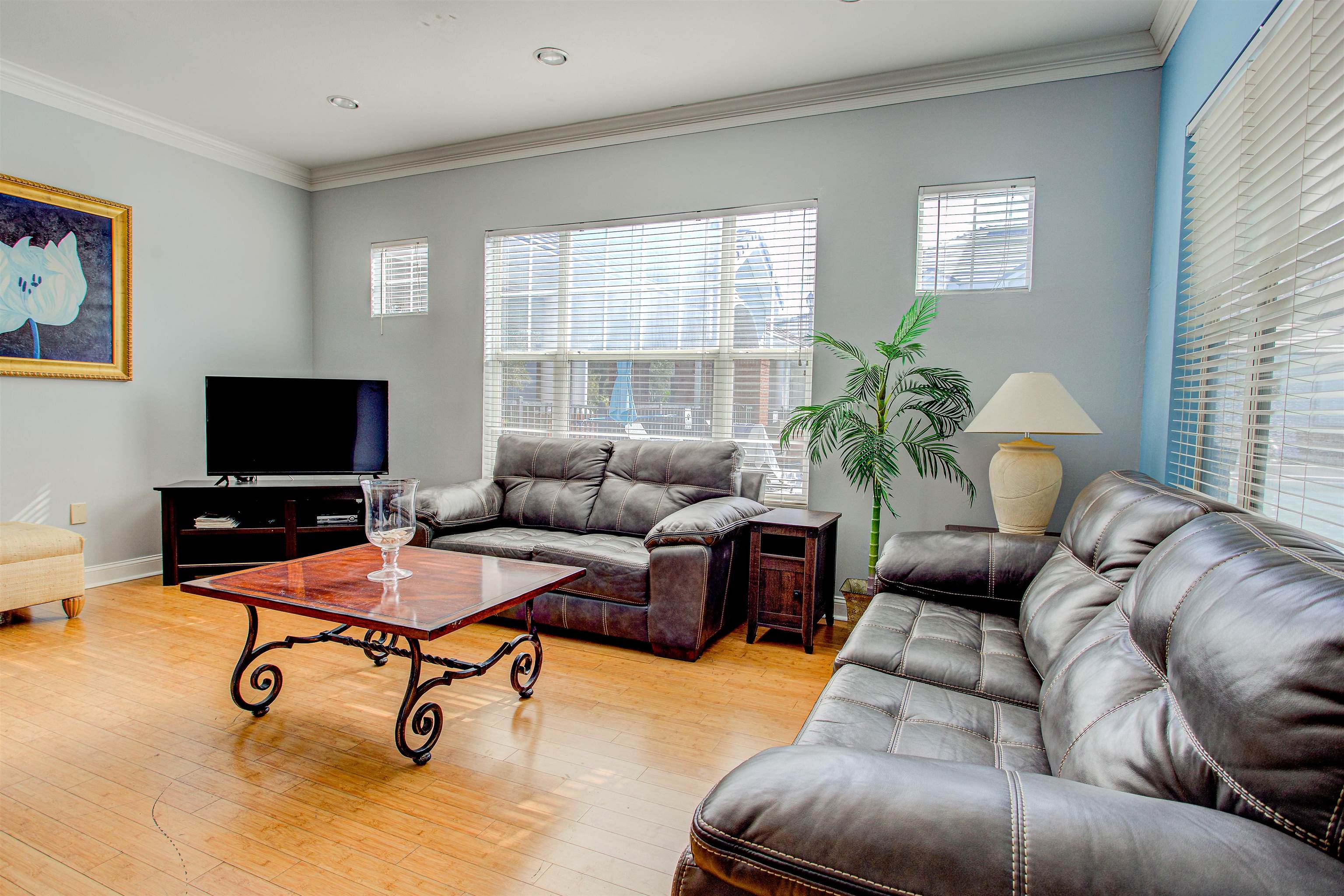 21201 Harbour Vista Circle St. Augustine, FL 32080 - Photo 38 of 43 a living room with furniture and a flat screen tv