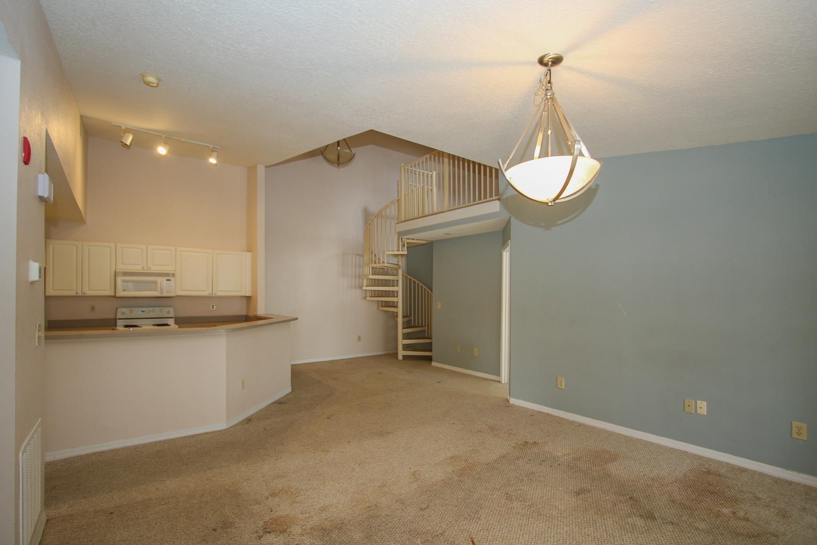 21201 Harbour Vista Circle St. Augustine, FL 32080 - Photo 9 of 43 a view of a kitchen with a sink and chandelier