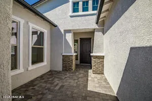 a view of front door of a house with stairs