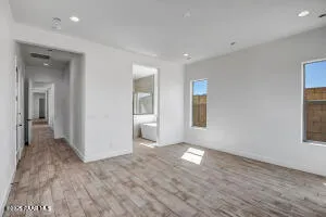 a bathroom with a bathtub and a sink
