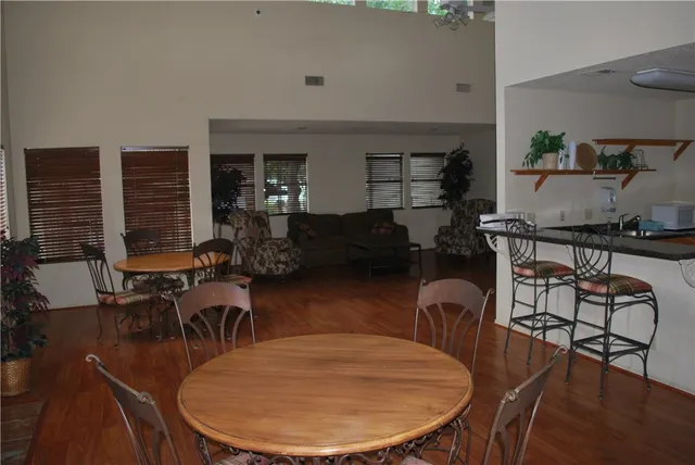 a view of a swimming pool with a yard