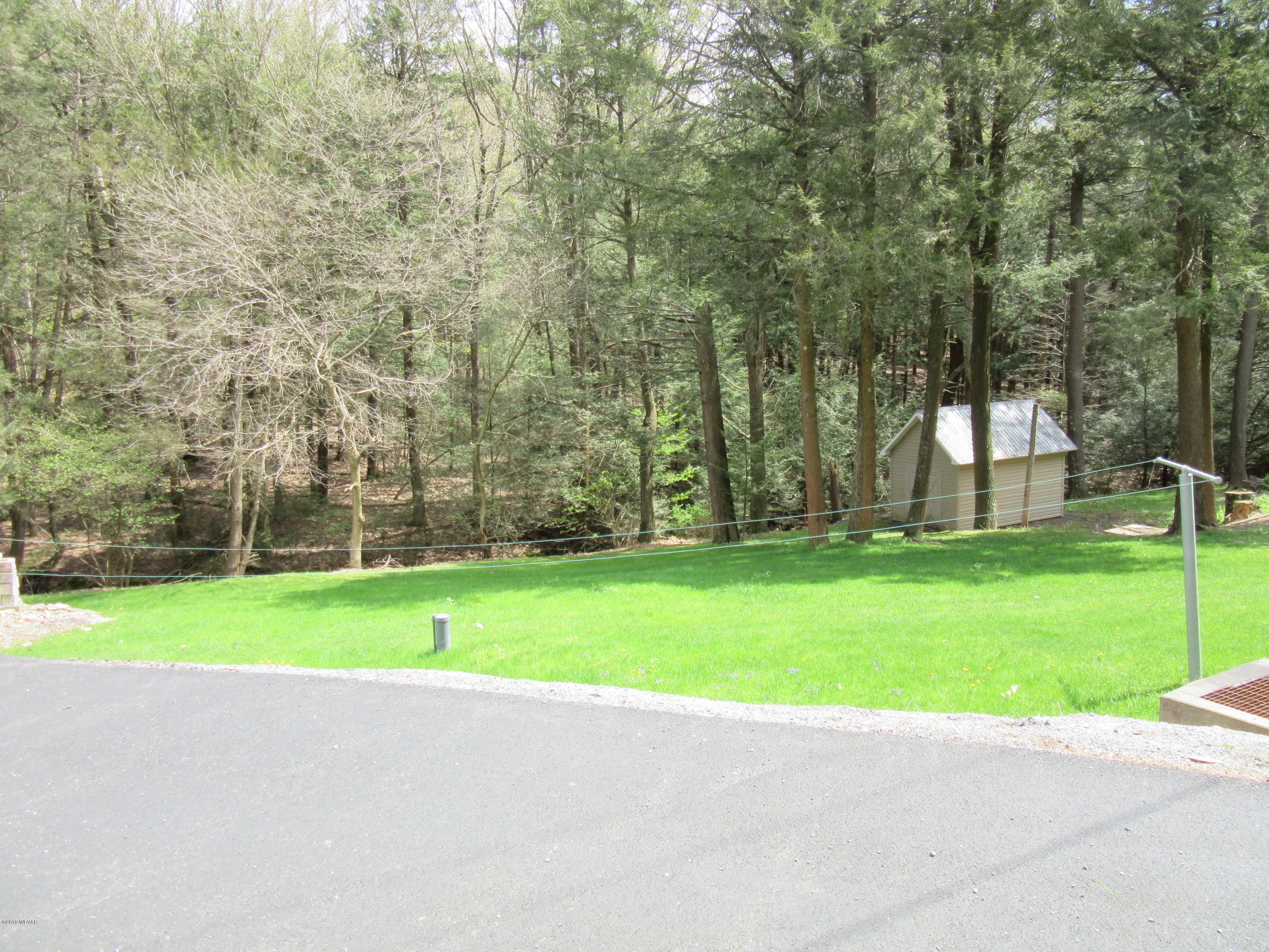 1457 Rockey Road Loganton, PA 17747 - Photo 2 of 22 Looking at state game lands, well head in middle of yard