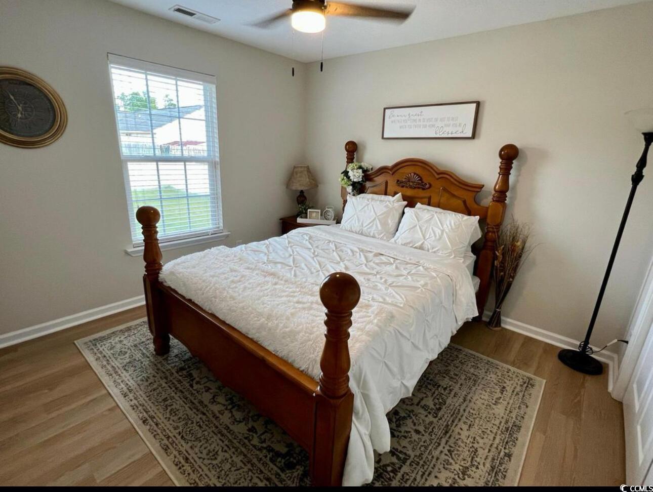 232 Oak Lea Drive Conway, SC 29526 - Photo 11 of 16 Bedroom featuring wood finished floors and ceiling fan
