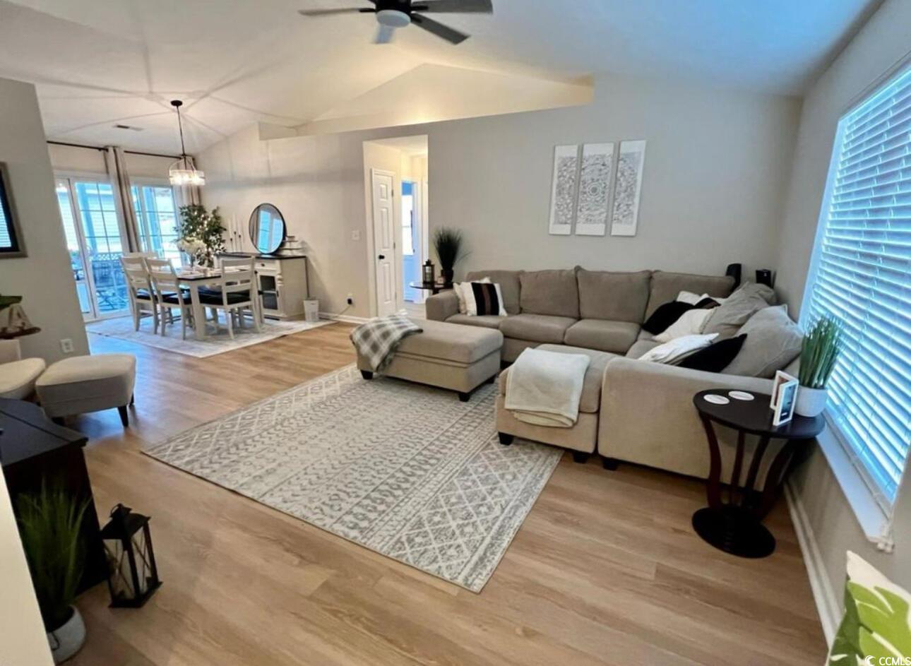 232 Oak Lea Drive Conway, SC 29526 - Photo 3 of 16 Living room featuring wood finished floors, lofted ceiling, and ceiling fan