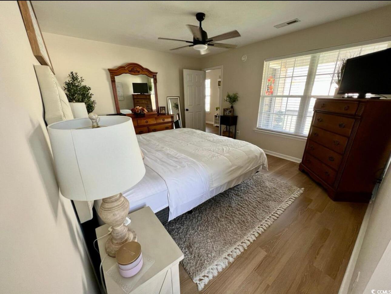 232 Oak Lea Drive Conway, SC 29526 - Photo 9 of 16 Bedroom featuring wood finished floors and a ceiling fan