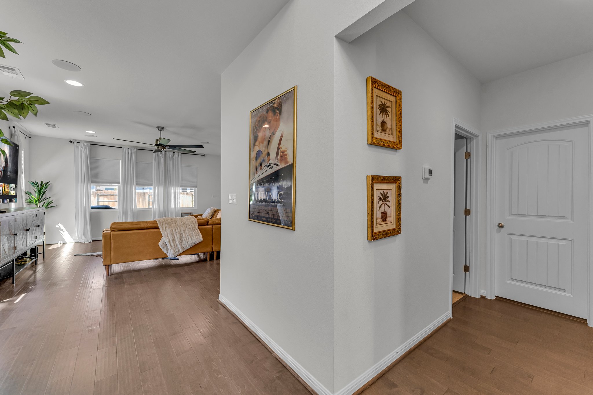 306 Cold Spg Loop Bastrop, TX 78602 - Photo 12 of 25 Hall featuring visible vents, recessed lighting, wood finished floors, and baseboards