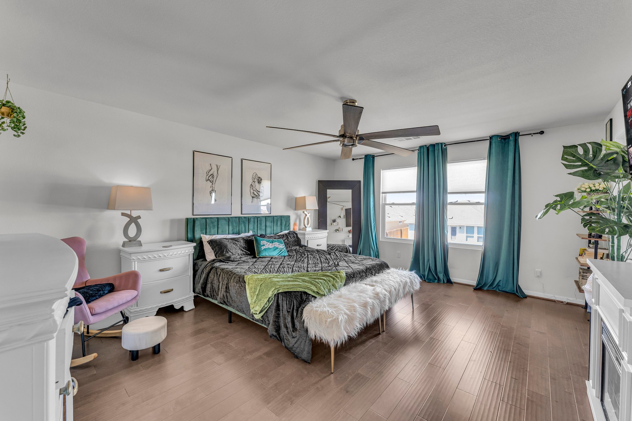306 Cold Spg Loop Bastrop, TX 78602 - Photo 13 of 25 Bedroom with baseboards, a ceiling fan, and wood finished floors