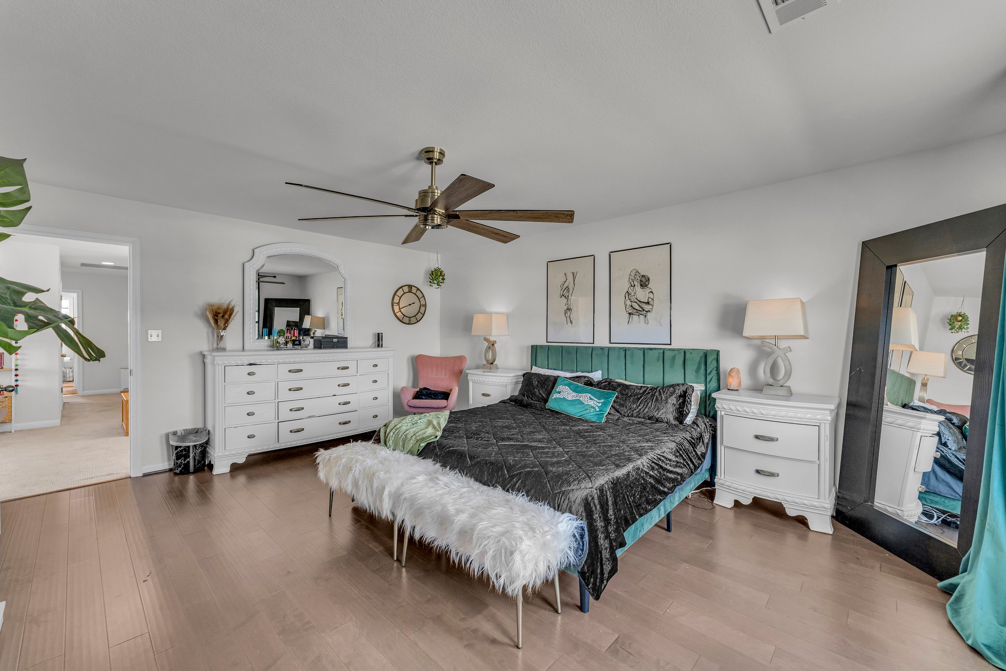 306 Cold Spg Loop Bastrop, TX 78602 - Photo 14 of 25 Bedroom featuring wood finished floors, visible vents, and ceiling fan