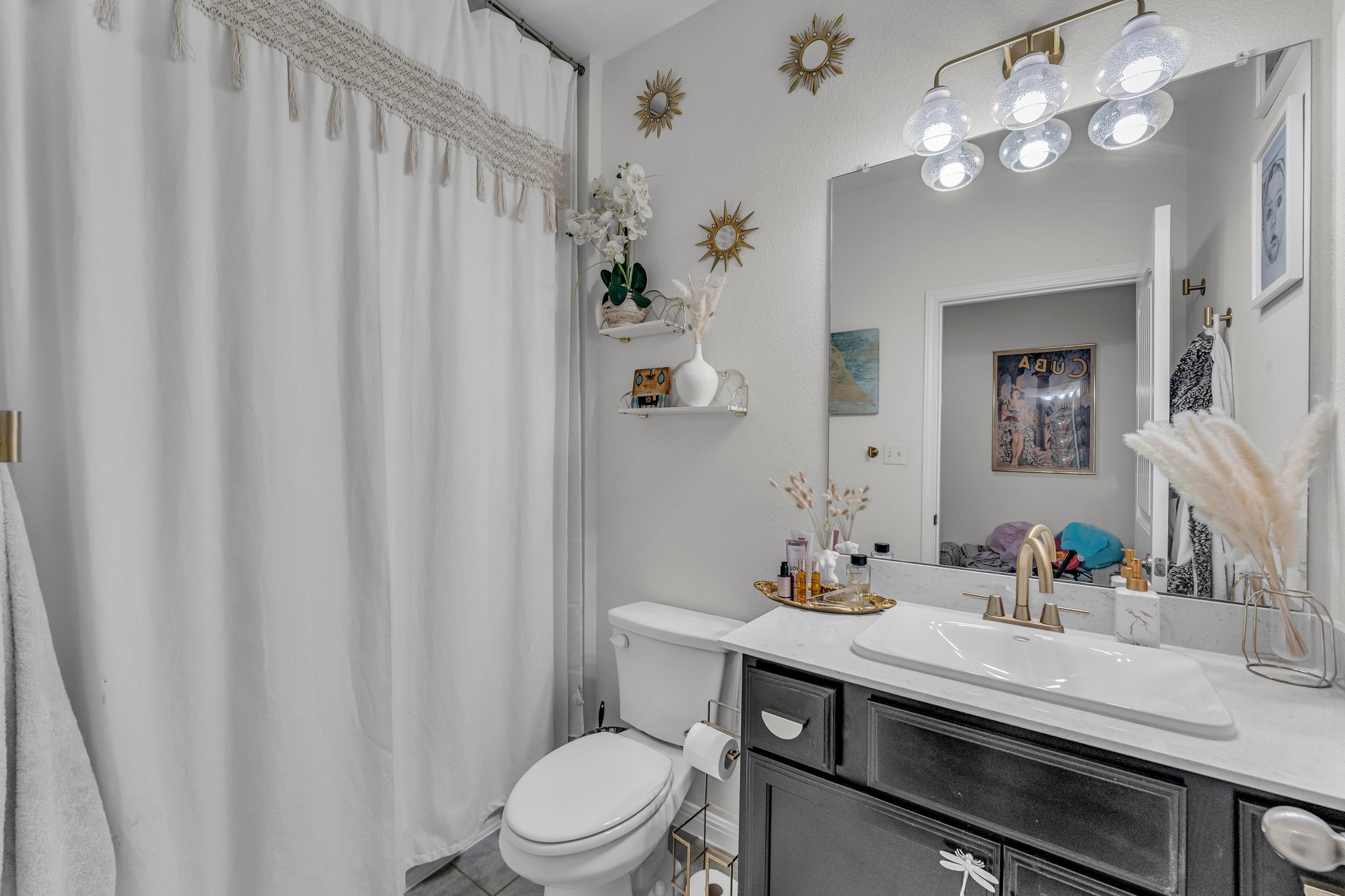 306 Cold Spg Loop Bastrop, TX 78602 - Photo 21 of 25 Ensuite bathroom featuring vanity, ensuite bath, and toilet