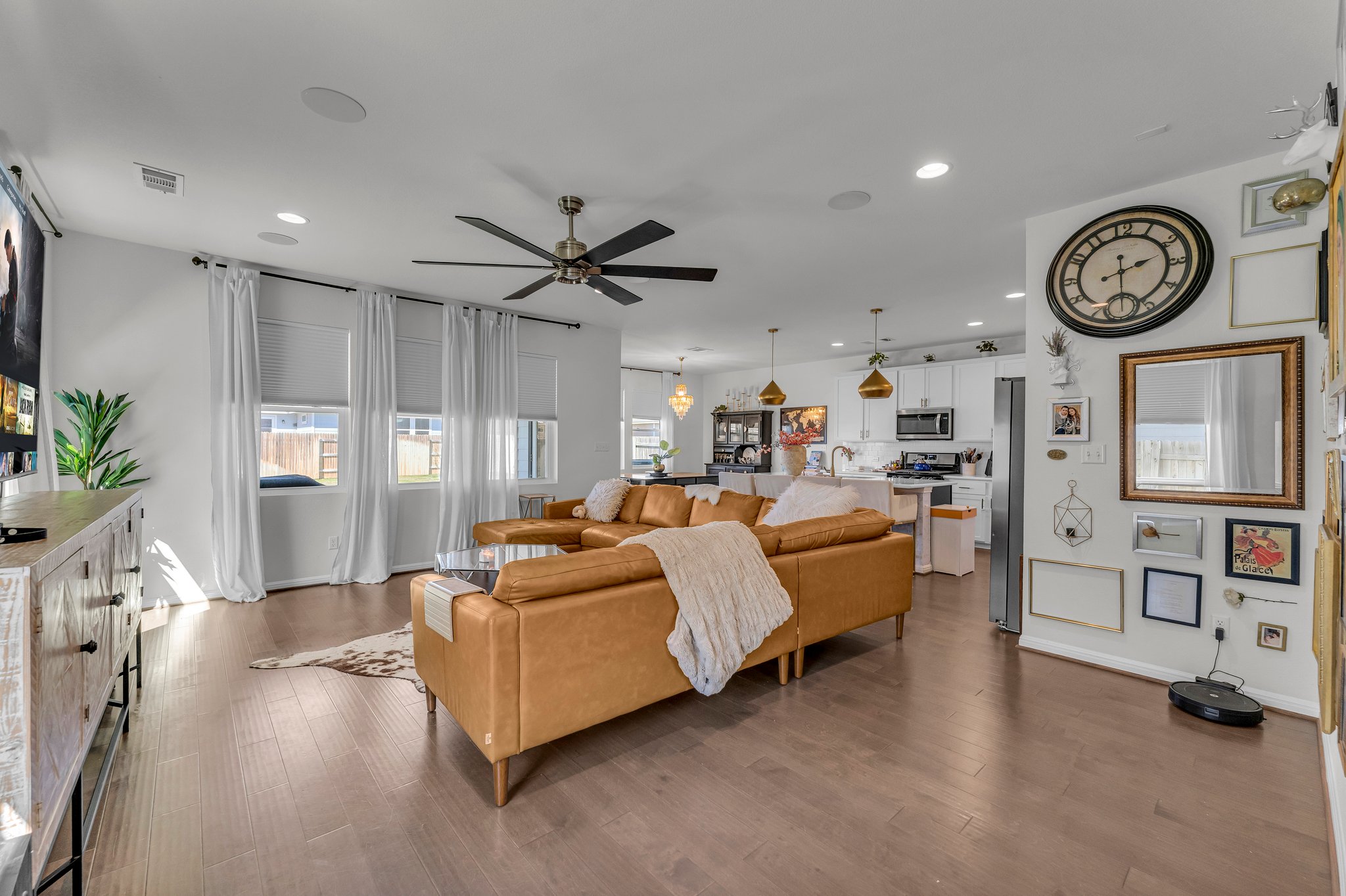 306 Cold Spg Loop Bastrop, TX 78602 - Photo 6 of 25 Living room featuring recessed lighting, visible vents, a ceiling fan, and dark wood-style flooring