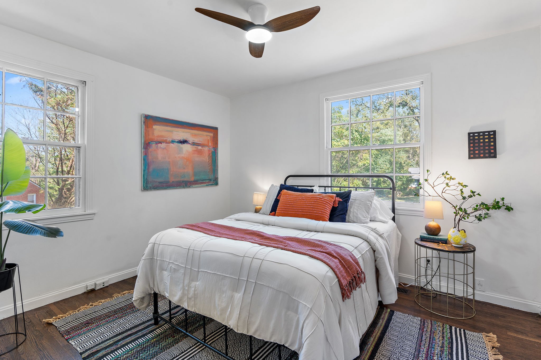 236 Barker Road Nashville, TN 37214 - Photo 14 of 45 Enter the beautiful primary bedroom, complete with gorgeous refinished original hardwoods and a brand new modern ceiling fan.