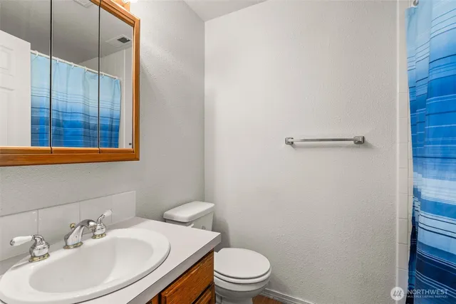 a view of a storage & utility room with washer and dryer